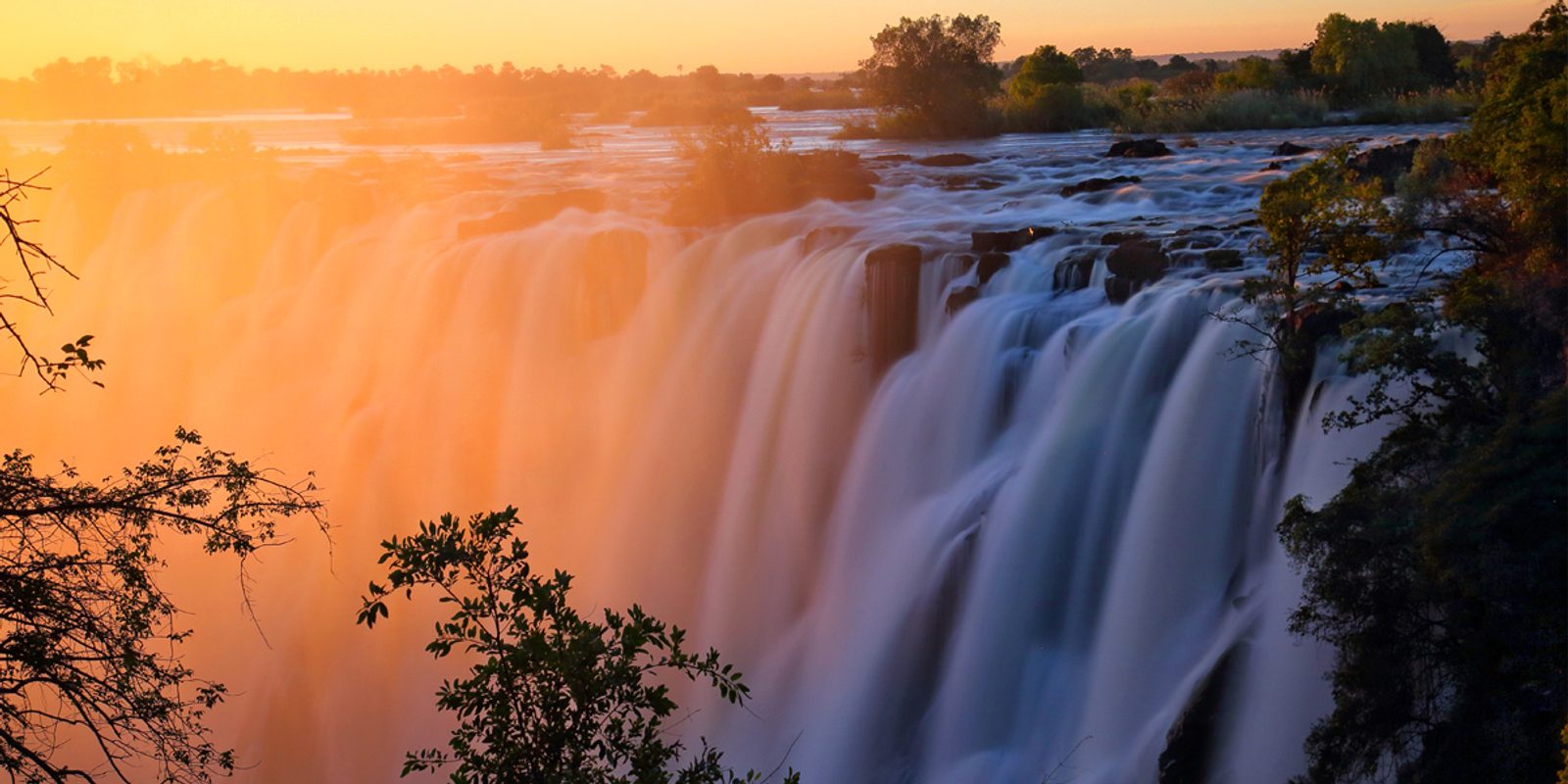 Victoria Falls at sunset is a definite bucket list experience for any traveler to the region.